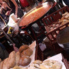 The food at Portobello Market was incredible. Here a vendor is selling paella and crusty bread.